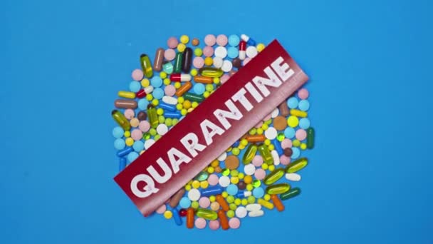 Top View Spinning Card Quarantine Lettering Non Pills Blue Background — Stock Video