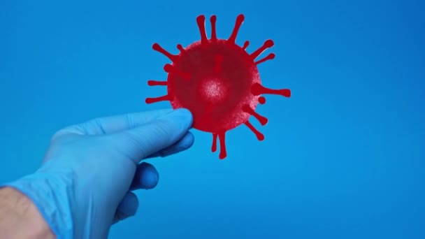 Cropped View Man Latex Glove Holding Coronavirus Bacteria Isolated Blue — Stock Video