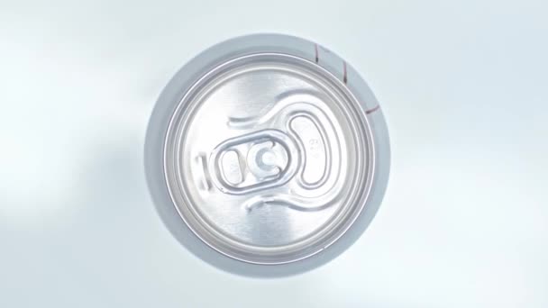 Top View Closed Beverage Can Rotating White Surfarce — Stock Video