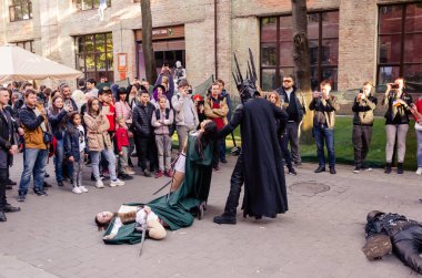 Kyiv, Ukrayna - 22 Eylül 2019. Comic Con Ukrayna Festivali. Süper kahraman kostümü giymiş oyuncular. Çizgi roman festivali