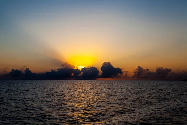 Захід сонця на Карибське море Стокове Зображення