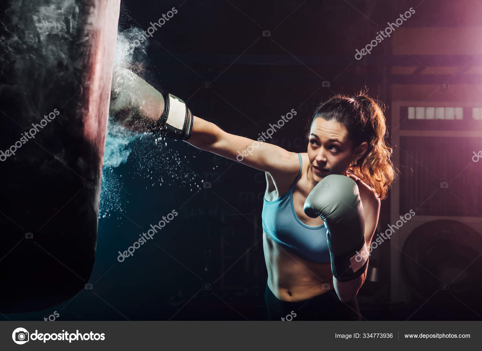Young Woman Training Boxing In The Punching Bag Sport Self Defense Boxing And Training Concepts Swing Boxing Stock Photo By C Miguelfrias