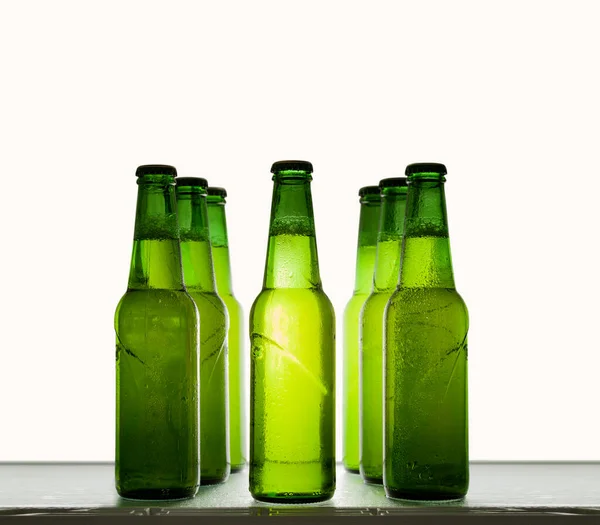 Green Beer Bottles Chilled Water Drops Shelf Light Background — Stock Photo, Image