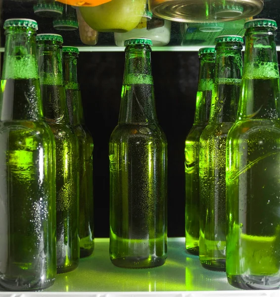 Green Beer Bottles Shelf Refrigerator Fog Glass — Stock Photo, Image