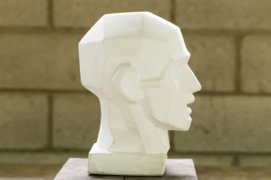 Öğretici ilkel sıva baş modeli.