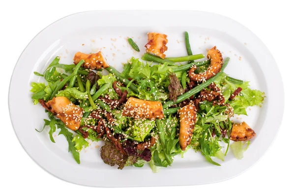 Salad with grilled octopus and dried tomatoes. — Stock Photo, Image