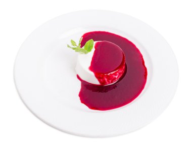 Vanilla panna cotta ile Ahududu reçeli.