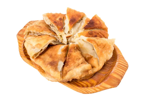 Delicious sliced puff pie with cabbage. — Stock Photo, Image