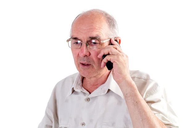 Stary człowiek rozmawia przez telefon. — Zdjęcie stockowe