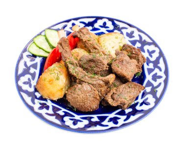 Sebze garnitür ile pişmiş kuzu rafları.