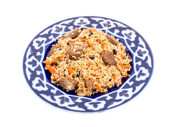 Geurige pilaf met vlees en gedroogde abrikozen. — Stockfoto