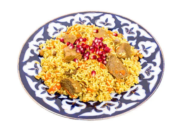 Fragrant pilaf with meat and dried apricots. — Stock Photo, Image