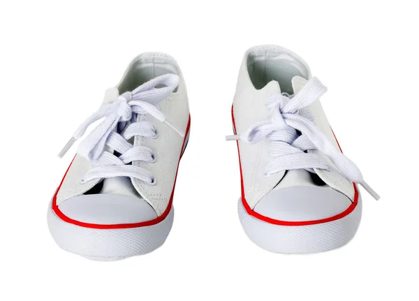 Взуття на білому полотні з червоною смугою . — стокове фото