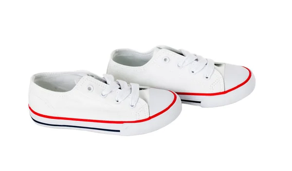 Λευκό καμβά παπούτσια με κόκκινη λουρίδα. — Φωτογραφία Αρχείου