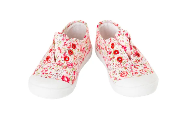 Πάνινα παπούτσια ροζ κορίτσι μωρό με άνθη μοτίβο. — Φωτογραφία Αρχείου