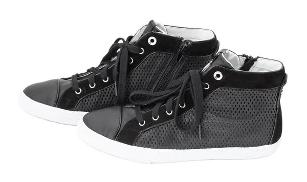 Black perforated leather sneakers. — Stock Photo, Image
