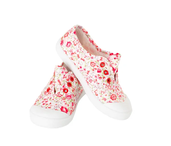 Baby girl pink sneakers with floral pattern. — Stock Photo, Image