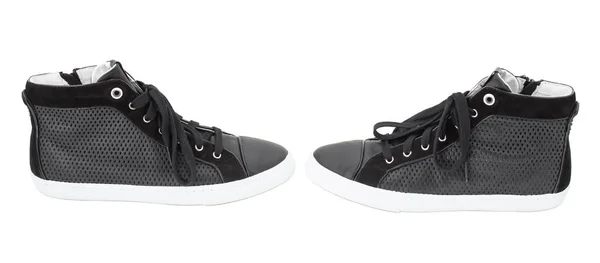 Black perforated leather sneakers. — Stock Photo, Image