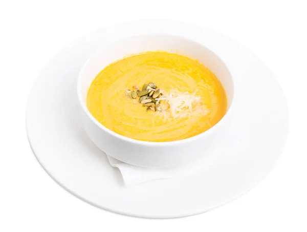 Pumpkin cream soup with grated cheese. — Stock Photo, Image