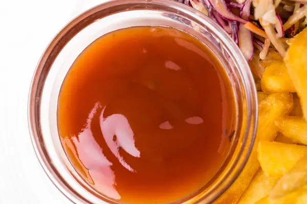 Closeup of ketchup in glass bowl. — Stock Photo, Image