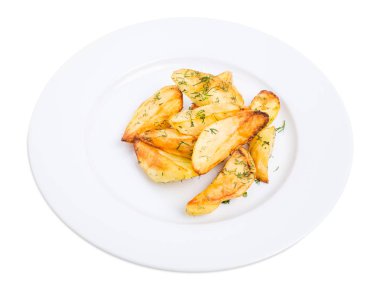 Patates dilimleri kıyılmış dereotu ile pişmiş.