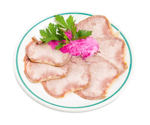 Baked veal tongue with horseradish cream. — Stock Photo, Image