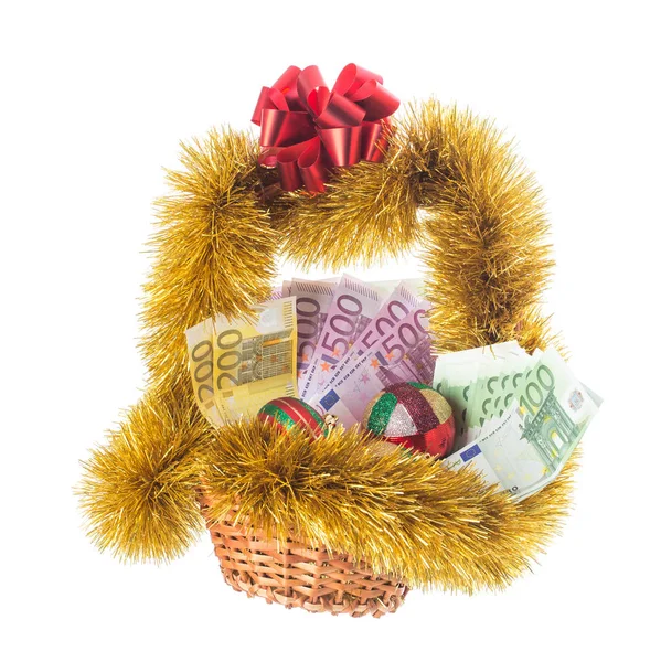 Wicker basket full of euro bills. Royalty Free Stock Images