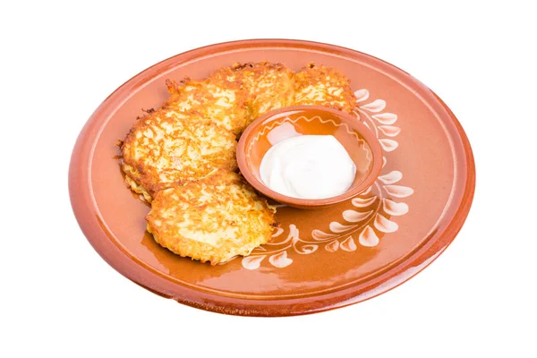 Delicious potato pancakes with sour cream. — Stock Photo, Image