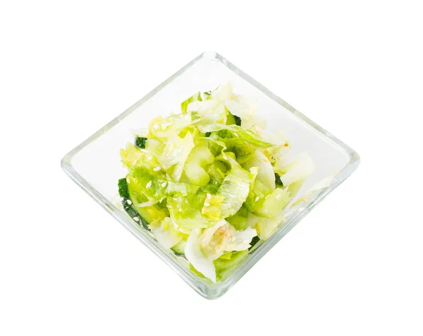 Fresh lettuce salad with cucumbers and sesame. — Stock Photo, Image