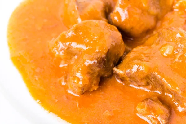 Carne deliciosa em molho de tomate . — Fotografia de Stock