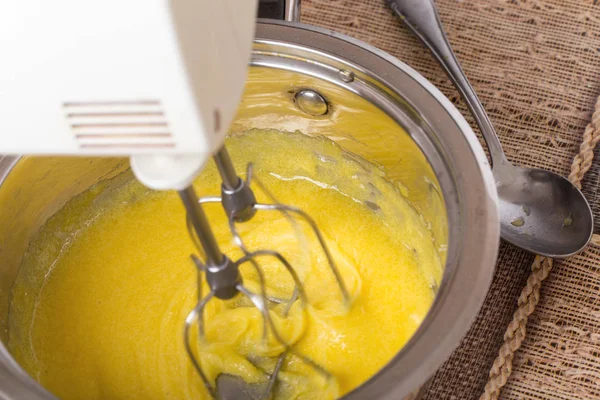 Mixing eggs and sugar for cake. — Stock Photo, Image