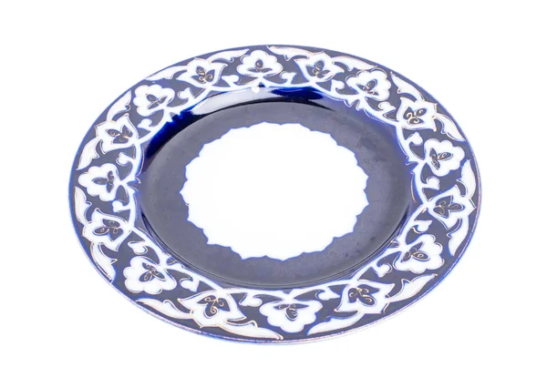 Азиатская плита с национальным круговым орнаментом . — стоковое фото