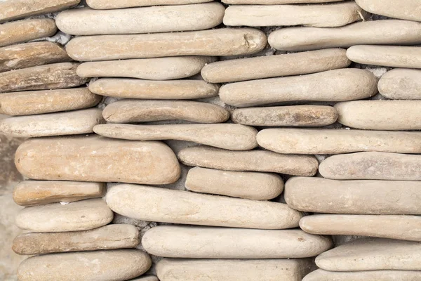 Pebble stenen muur. — Stockfoto