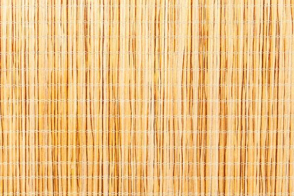 Brown bamboo straw mat.