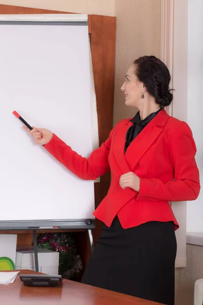 Business woman standing near the whiteboard. — Stock Photo, Image