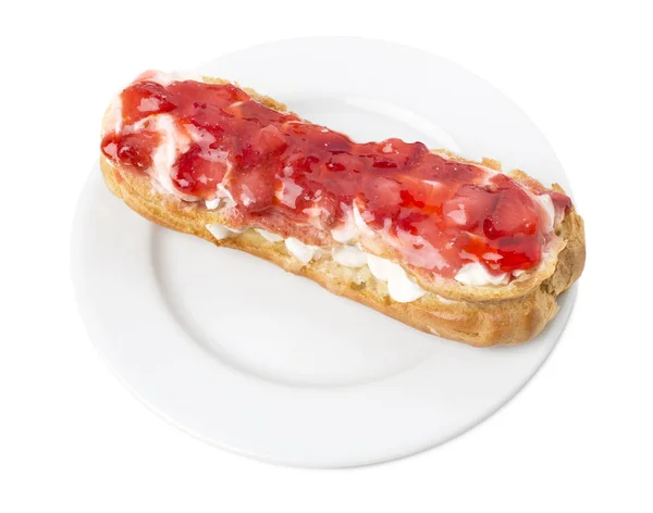 Delicious eclair with strawberry jam. — Stock Photo, Image