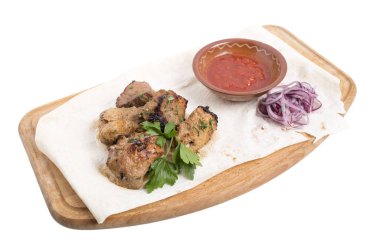 Dilimlenmiş domates soslu domuz eti.