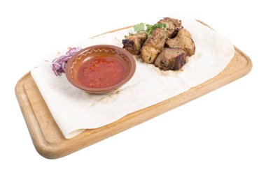 Dilimlenmiş domates soslu domuz eti.