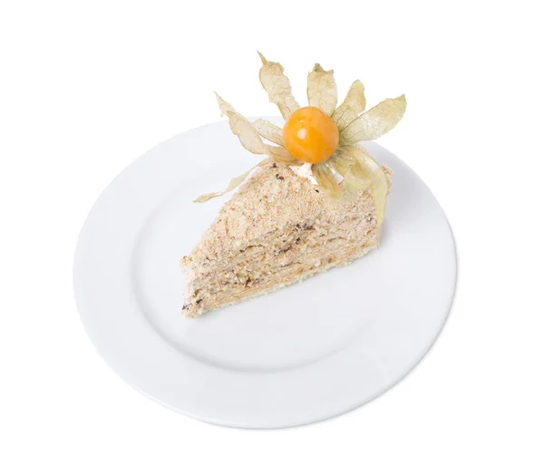 Puff cake with walnuts and physalis. — Stock Photo, Image