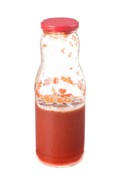 Bir cam şişe eski domates suyu. — Stok fotoğraf