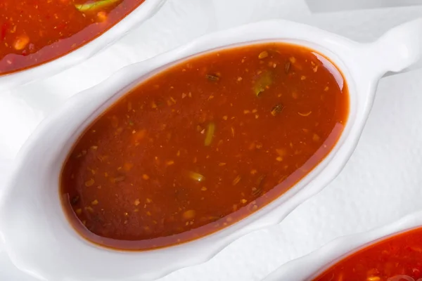 Czerwony pomidor hot sauce zbliżenie. — Zdjęcie stockowe