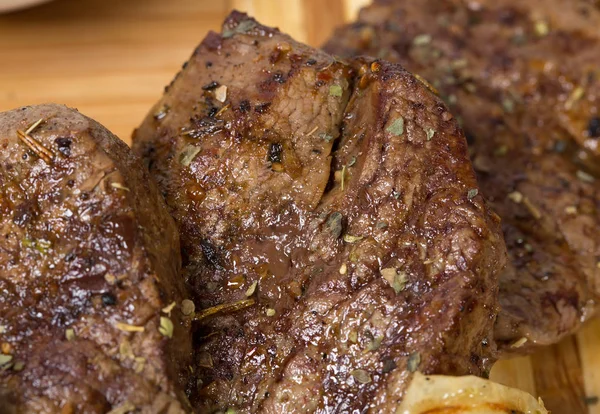 Mixed grilled meats platter closeup. — Stock Photo, Image