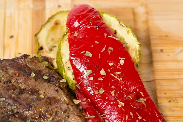 stock image Mixed grilled meats platter closeup.