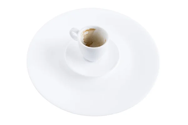 Una tazza di caffè è vuota su un piattino e un piatto . — Foto Stock