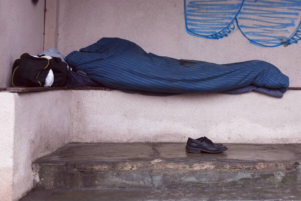 Sleeping homeless on the bus station.