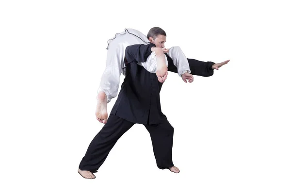 Atlet dewasa melakukan latihan goju-ryu formal . — Stok Foto