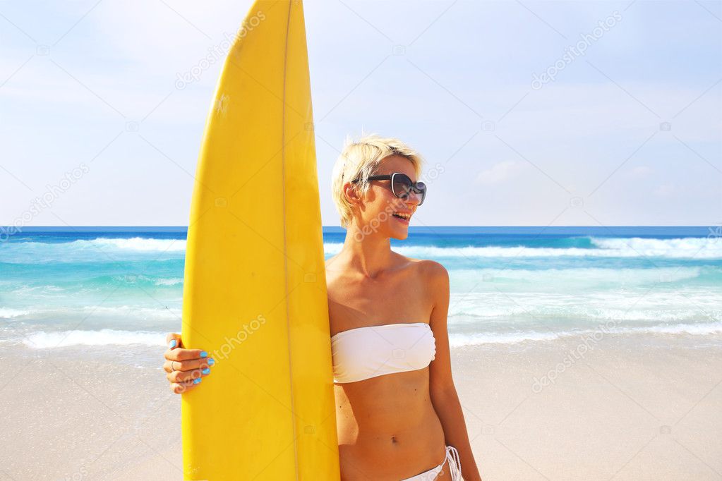 surfer girl on the beach