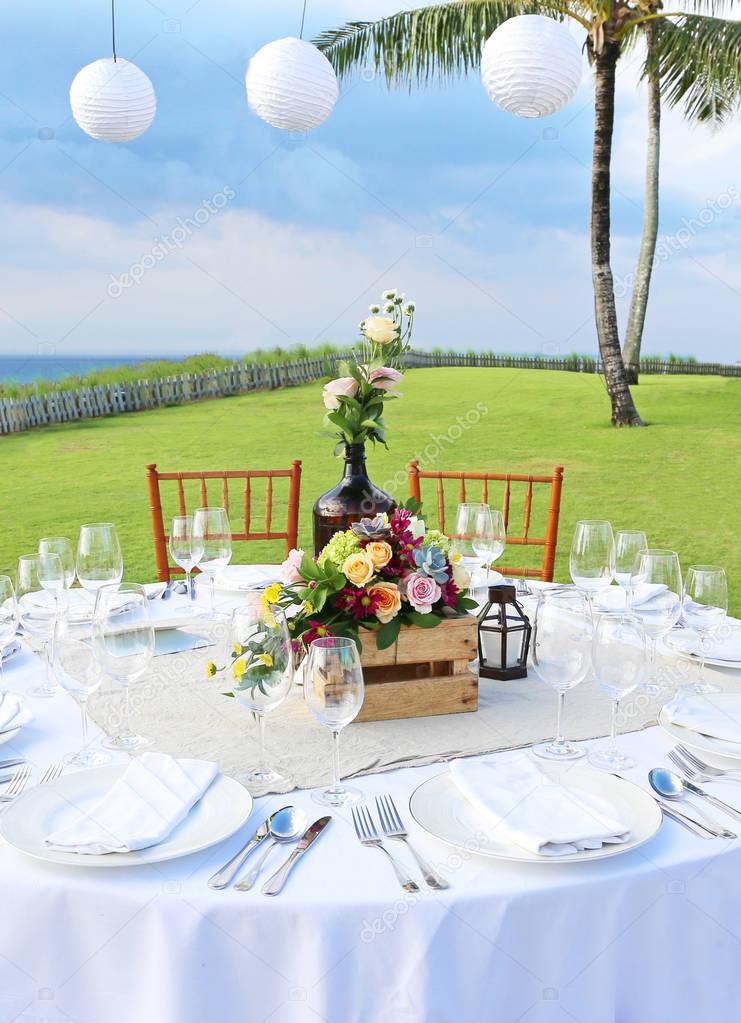 Decorated wedding table at reception beach resort