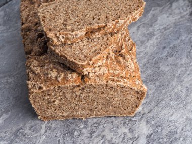 whole wheat bread on a gray stone