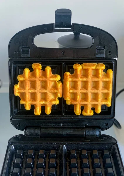 Cooking Belgian Waffles Black Waffle Iron White Table — Stock Photo, Image